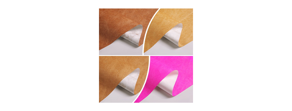 2.Assorted colored DuPont Tyvek® material rolls showing paper‑like textured non‑woven fabric