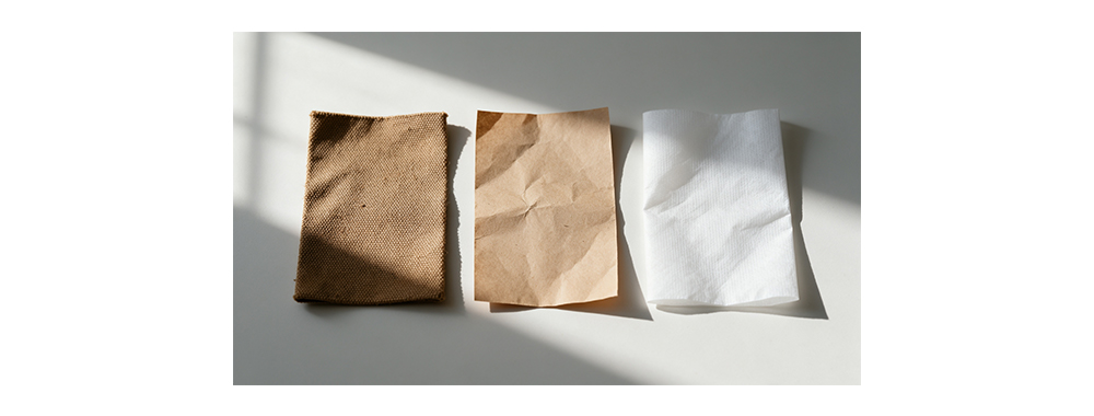 Side‑by‑side material comparison--canvas, kraft paper and white Tyvek® non‑woven fabric